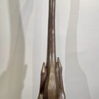 Alt text: Bronze sculpture of a swan