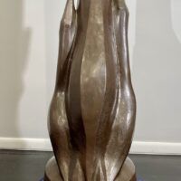 Alt text: Bronze sculpture of a swan