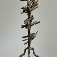 Alt text: Bronze sculpture of birds in circles