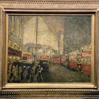 Alt text: Painting of a city street scene with double decker buses and pedestrians crossing the road, framed