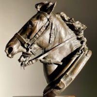 Alt text: Bronze sculpture of a horse head