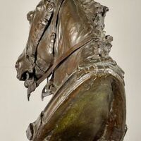 Alt text: Bronze sculpture of a horse head