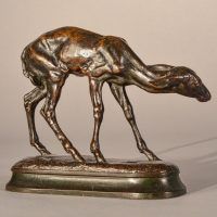 Alt text: Bronze sculpture of a scared fawn, angled view