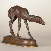 Alt text: Bronze sculpture of a young fawn