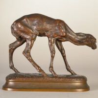 Alt text: Bronze sculpture of a young fawn