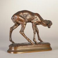 Alt text: Bronze sculpture of a young fawn