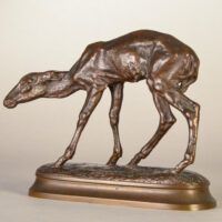 Alt text: Bronze sculpture of a young fawn