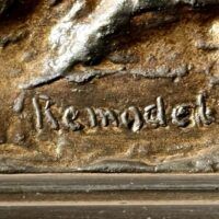 Alt text: Bronze sculpture, signature detail