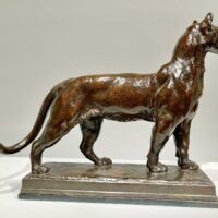 Alt text: Bronze sculpture of a puma