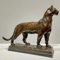 Alt text: Bronze sculpture of a puma