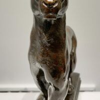 Alt text: Bronze sculpture of a puma
