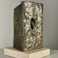 Alt text: Abstract metal sculpture