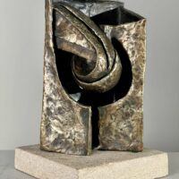 Alt text: Abstract metal sculpture