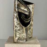 Alt text: Abstract metal sculpture