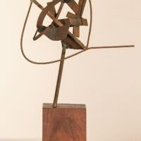 Alt text: Abstract bronze sculpture