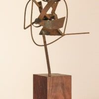Alt text: Abstract bronze sculpture