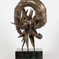 Alt text: Abstract bronze sculpture with rounded top fixed to a marble base, frontal view