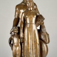 Alt text: Bronze sculpture of a standing family