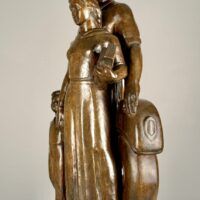 Alt text: Bronze sculpture of a standing family