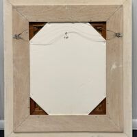 Alt text: Framed painting verso