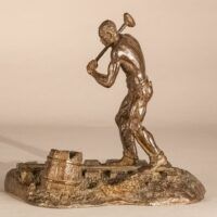 Alt text: Bronze sculpture of a railroad worker