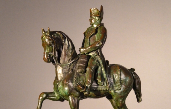 Alt text: Bronze sculpture of Napoleon Bonaparte on horseback