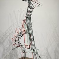 Alt text: Abstract wire sculpture 