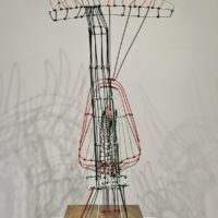 Alt text: Abstract wire sculpture 