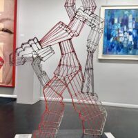 Alt text: Painted wire sculpture