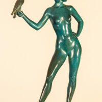 Alt text: Bronze sculpture of a nude female figure