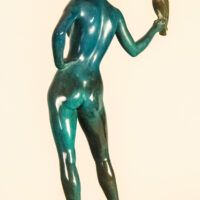 Alt text: Bronze sculpture of a nude female figure