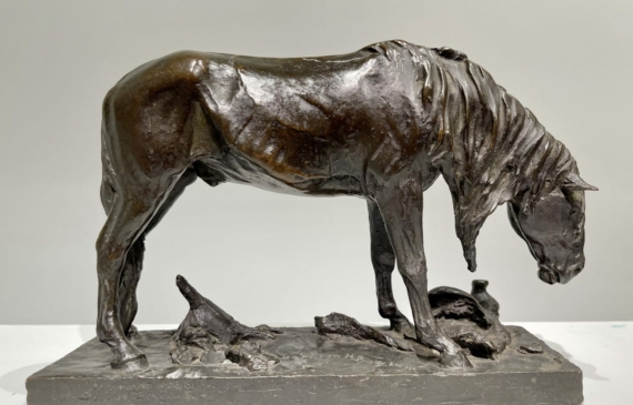 Alt text: Bronze sculpture of a horse