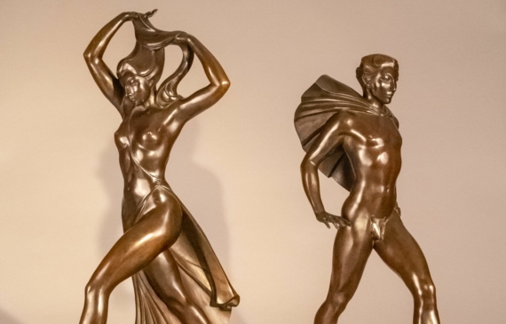 Alt text: Bronze sculpture of a male and female figure