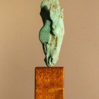 Alt text: Bronze sculpture of a horse head