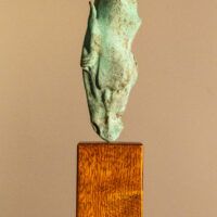 Alt text: Bronze sculpture of a horse head