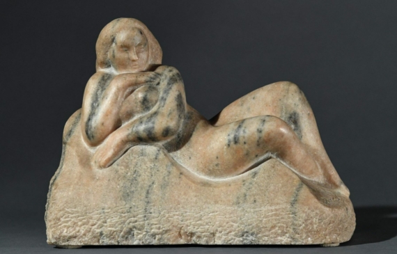 Marble carving of a reclining nude woman