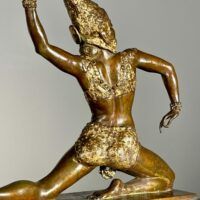 Alt text: Bronze sculpture of a female dancer