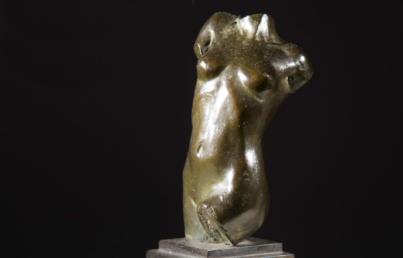 Alt text: bronze sculpture of a female torso