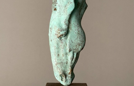 Alt text: Bronze sculpture of a horse head