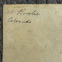 Alt text: Painting verso, inscription detail