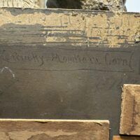 Alt text: Painting verso, label details