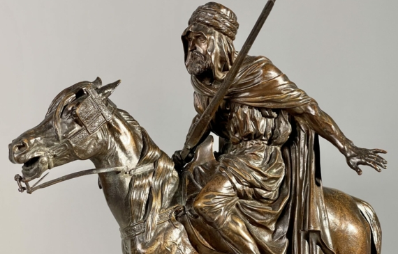 Alt text: bronze sculpture of man on horse