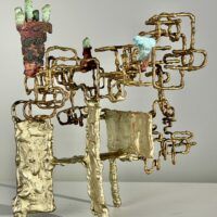 Alt text: Abstract metal sculpture