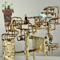 Alt text: Abstract metal sculpture