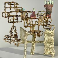 Alt text: Abstract metal sculpture