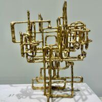 Alt text: Abstract metal sculpture