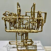 Alt text: Abstract metal sculpture