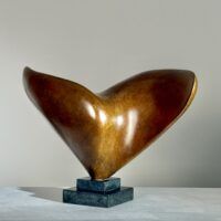 Alt text: Abstract bronze sculpture