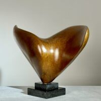 Alt text: Abstract bronze sculpture