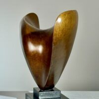 Alt text: Abstract bronze sculpture